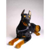 Animaux-Bois-Animaux-Bronzes propose Chien Doberman 70 cm peluche animaux allongés réaliste Piutre 271